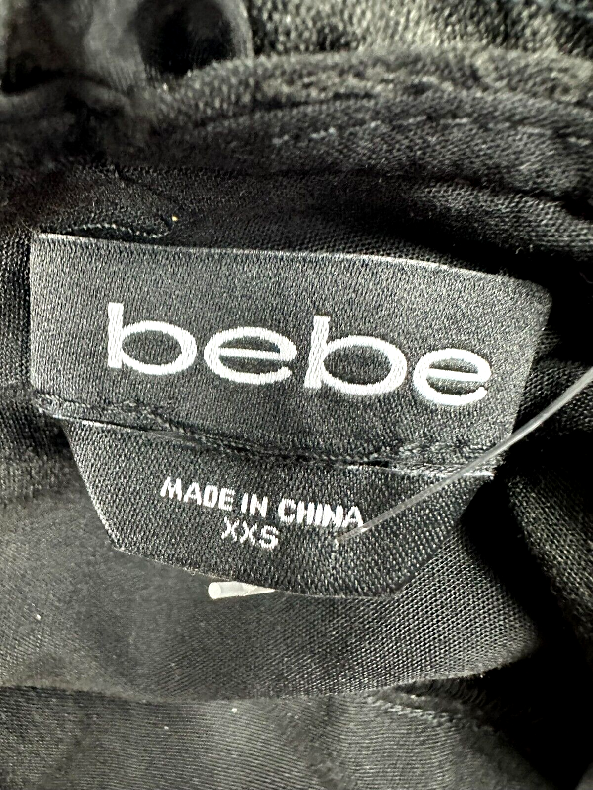 Women's Black Bebe Open Back Ruffle Romper- Size XXS